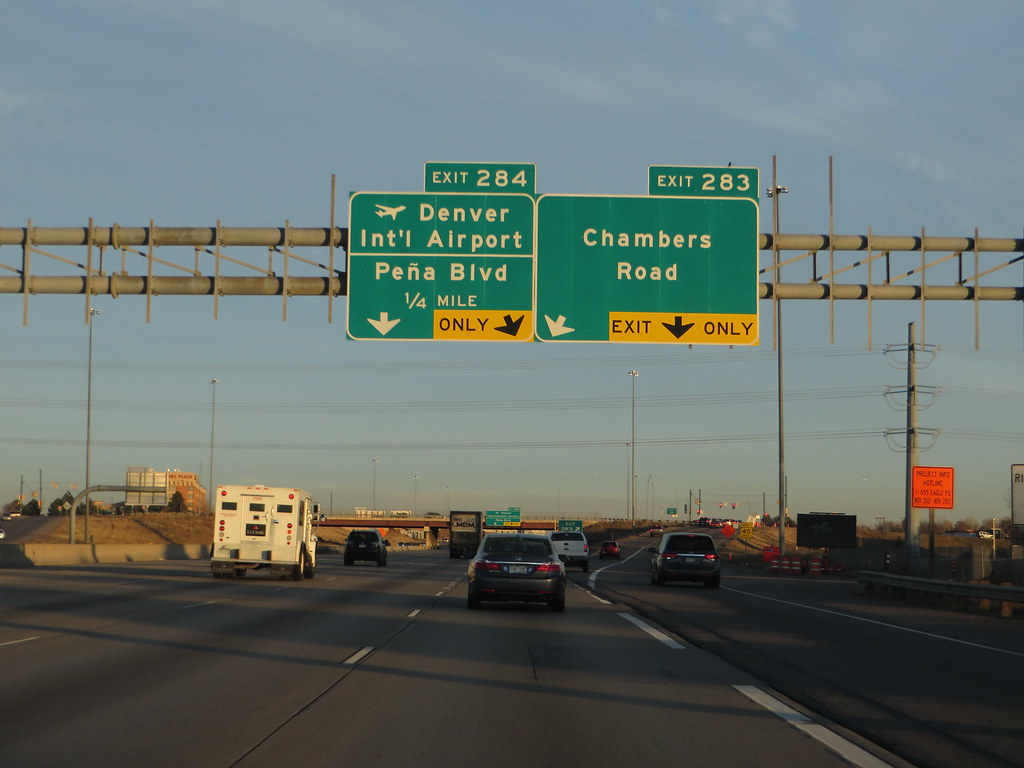 "Denver International Airport Exit, Interstate 70, Denver, Colorado" by Ken Lund is licensed under CC BY-SA 2.0.