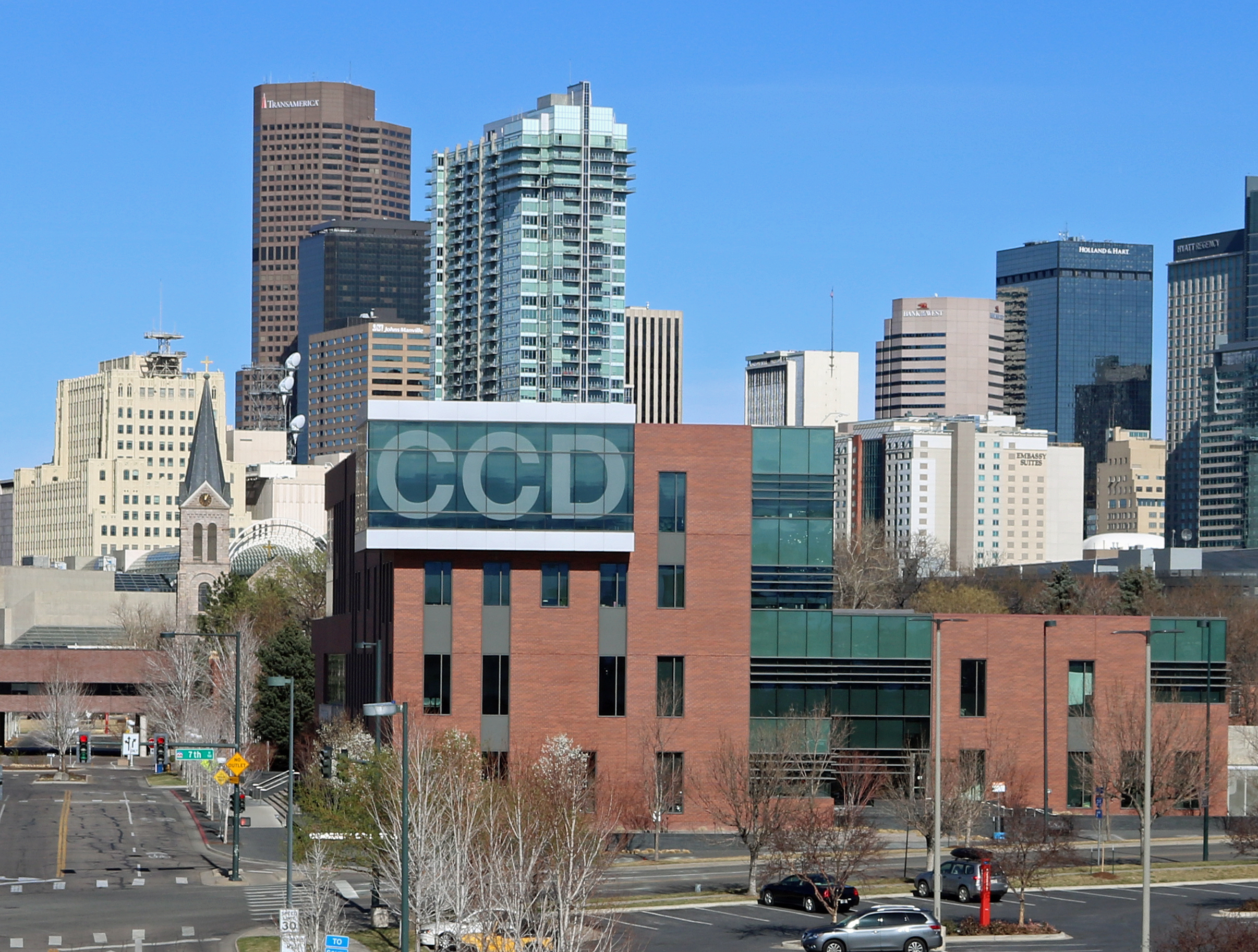Downtown Denver rises beyond the shared Auraria Campus and its brewery roots