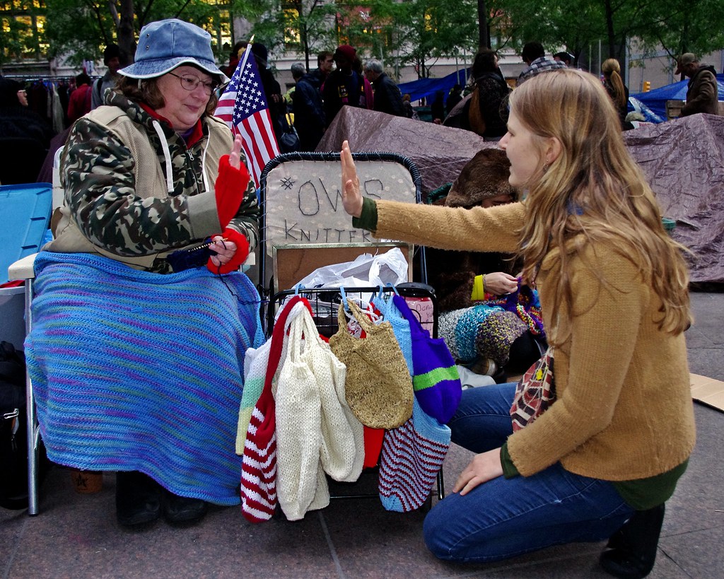 "Day 36 Occupy Wall Street October 21 2011 Shankbone 34" by david_shankbone is marked with Public Domain Mark 1.0. To view the terms, visit https://creativecommons.org/publicdomain/mark/1.0/.