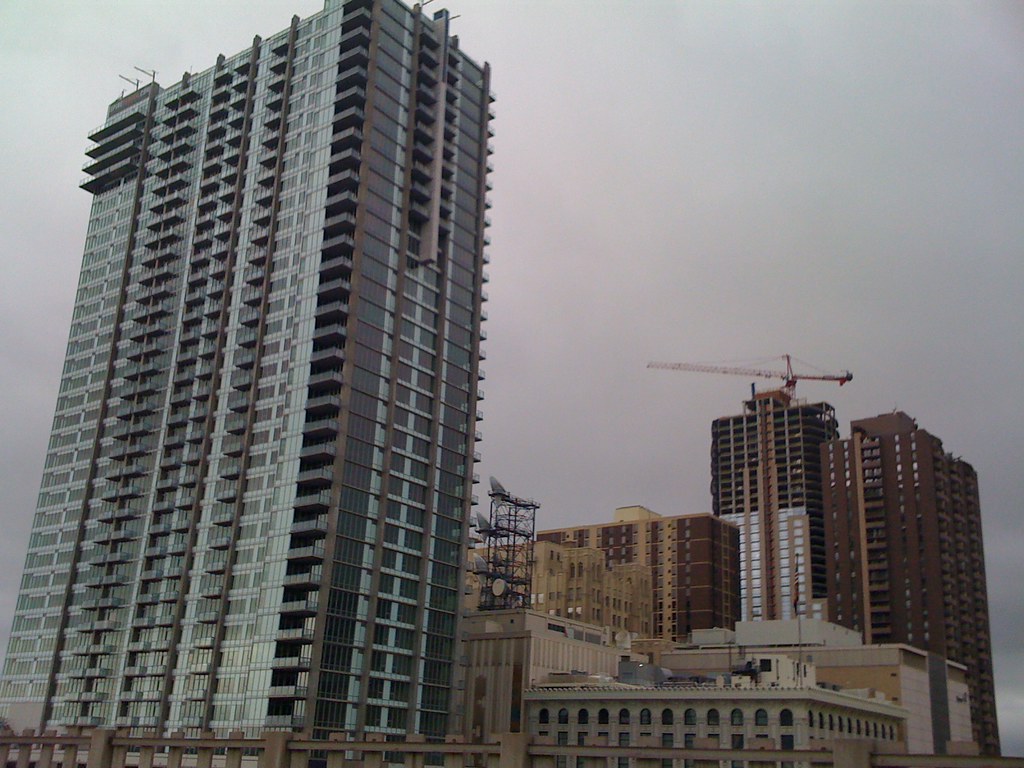 "Construction in Downtown Denver" by Luis in Denver is licensed under CC BY 2.0.