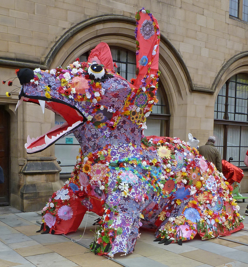 "'Corgi' waiting for Bradford Lord Mayor's Parade to start" by Tim Green aka atoach is licensed under CC BY 2.0.