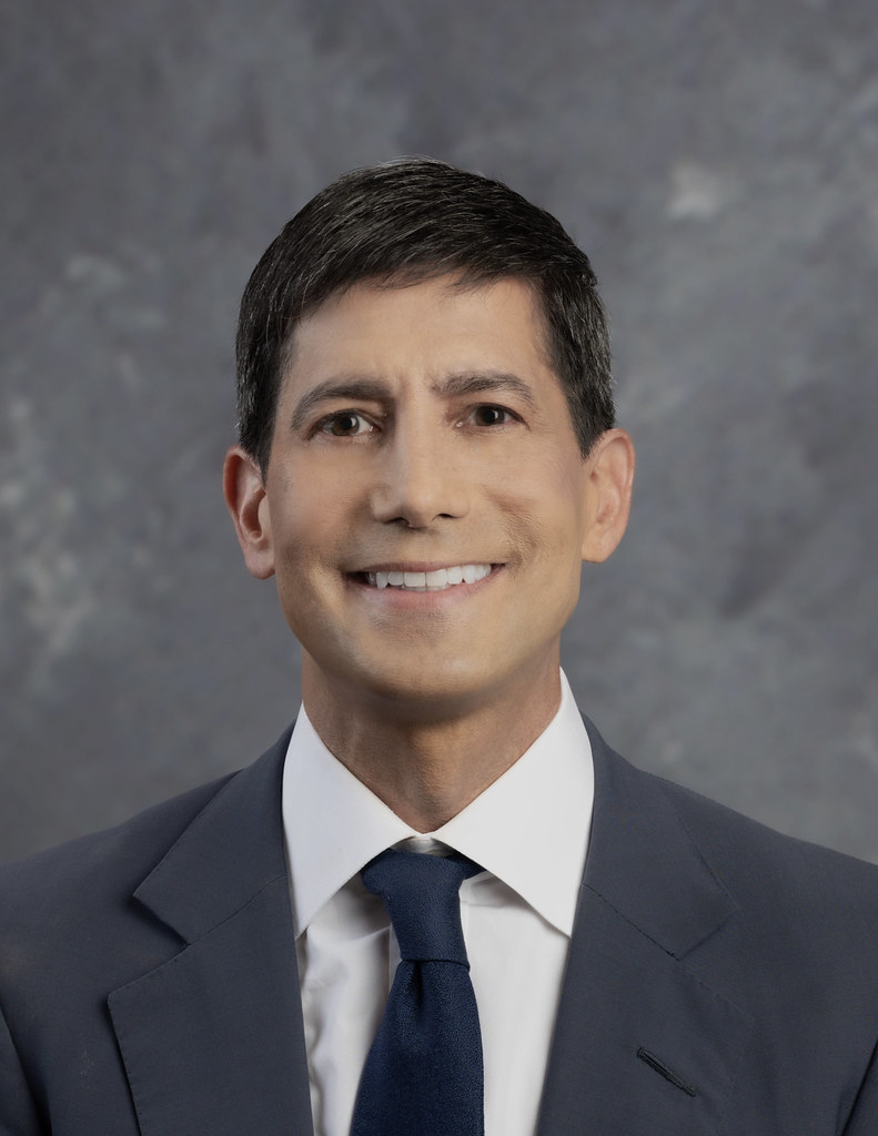 "Chairman_Kevin_Warsh_Portrait_007_June_16_2026-1905" by Federalreserve is marked with Public Domain Mark 1.0. To view the terms, visit https://creativecommons.org/publicdomain/mark/1.0/.