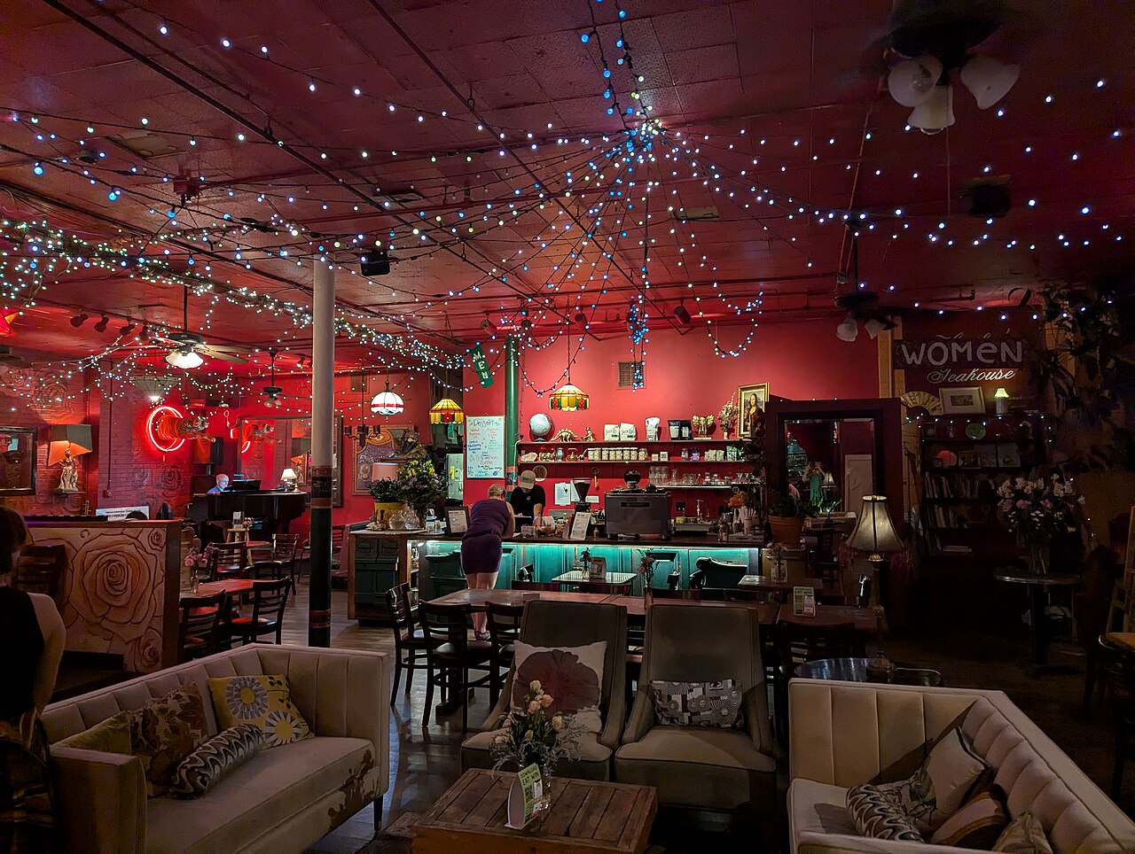 "Interior of the Mercury Cafe, Denver" by Sdkb is licensed under CC BY-SA 4.0.