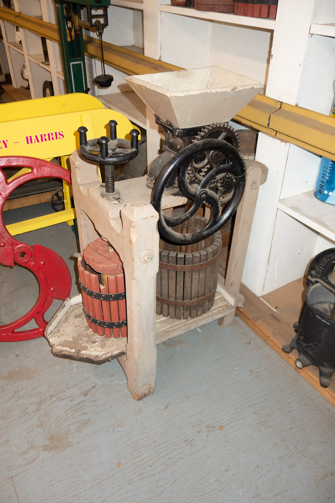 "Antique cider press" by quinet is licensed under CC BY 2.0.