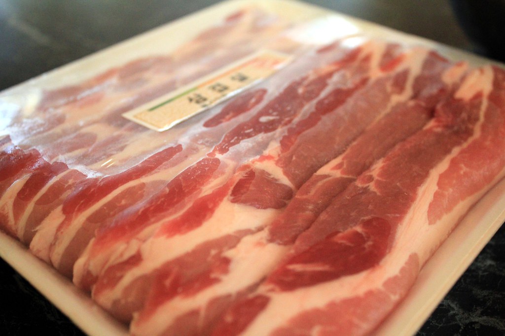 "Pork belly for Korean BBQ" by KFoodaddict is licensed under CC BY 2.0.