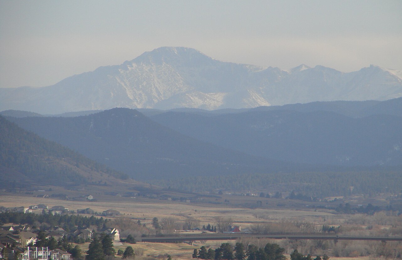 "File:Pikes Peak as seen from Castle Rock CO.JPG" by Jeff Albright is licensed under CC BY-SA 3.0.