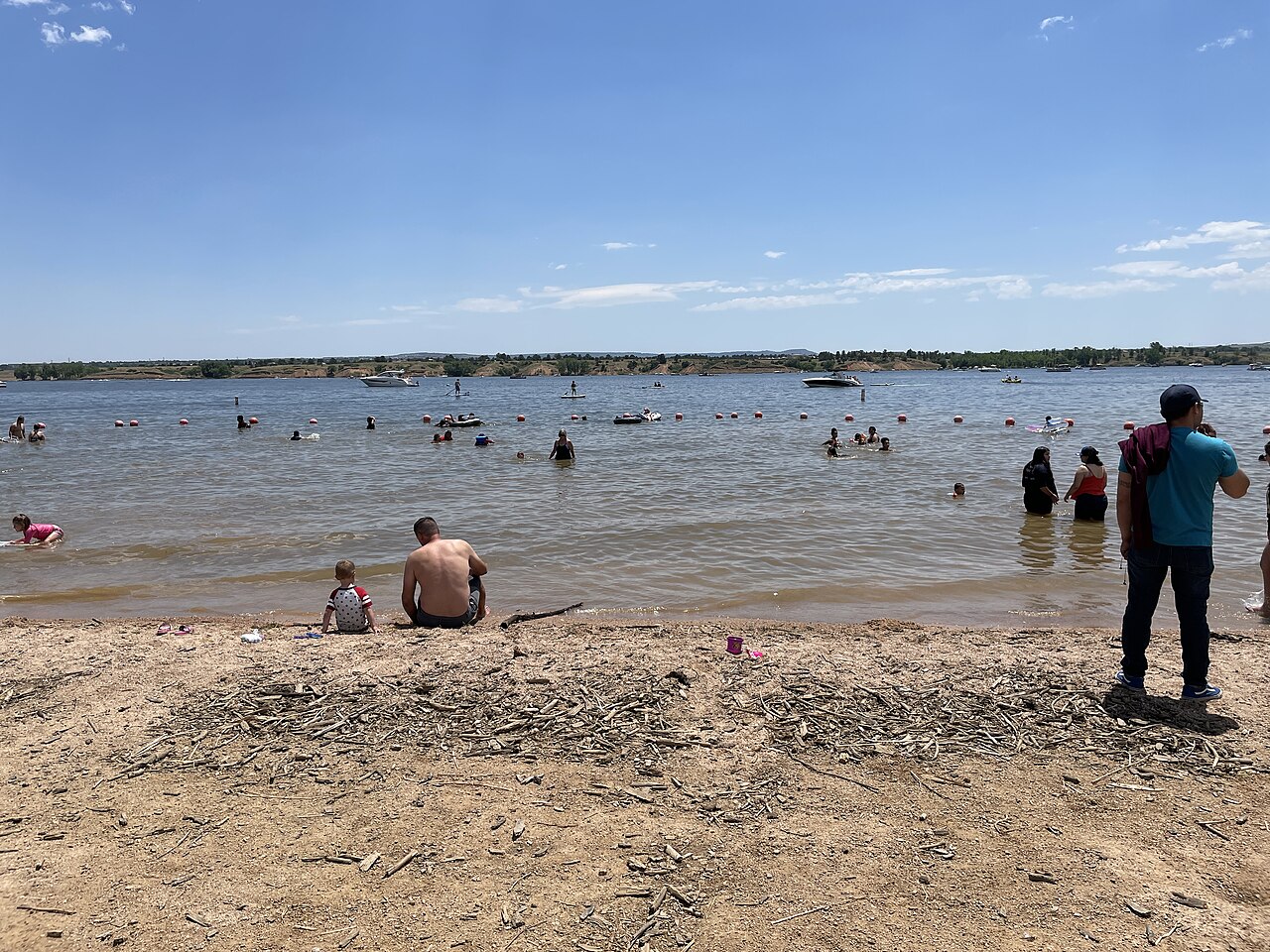 "Chatfield Reservoir looking east from Chatfield Swim Beach" by Dough4872 is licensed under CC BY-SA 4.0.