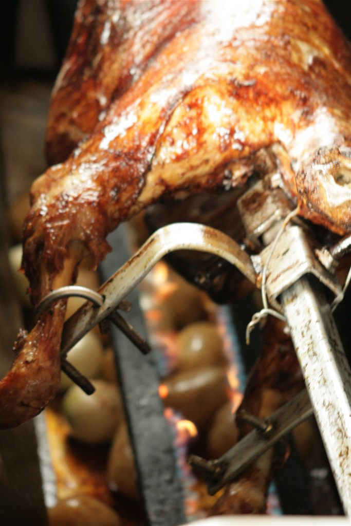 "Lamb spit roast" by 23am.com is licensed under CC BY 2.0.